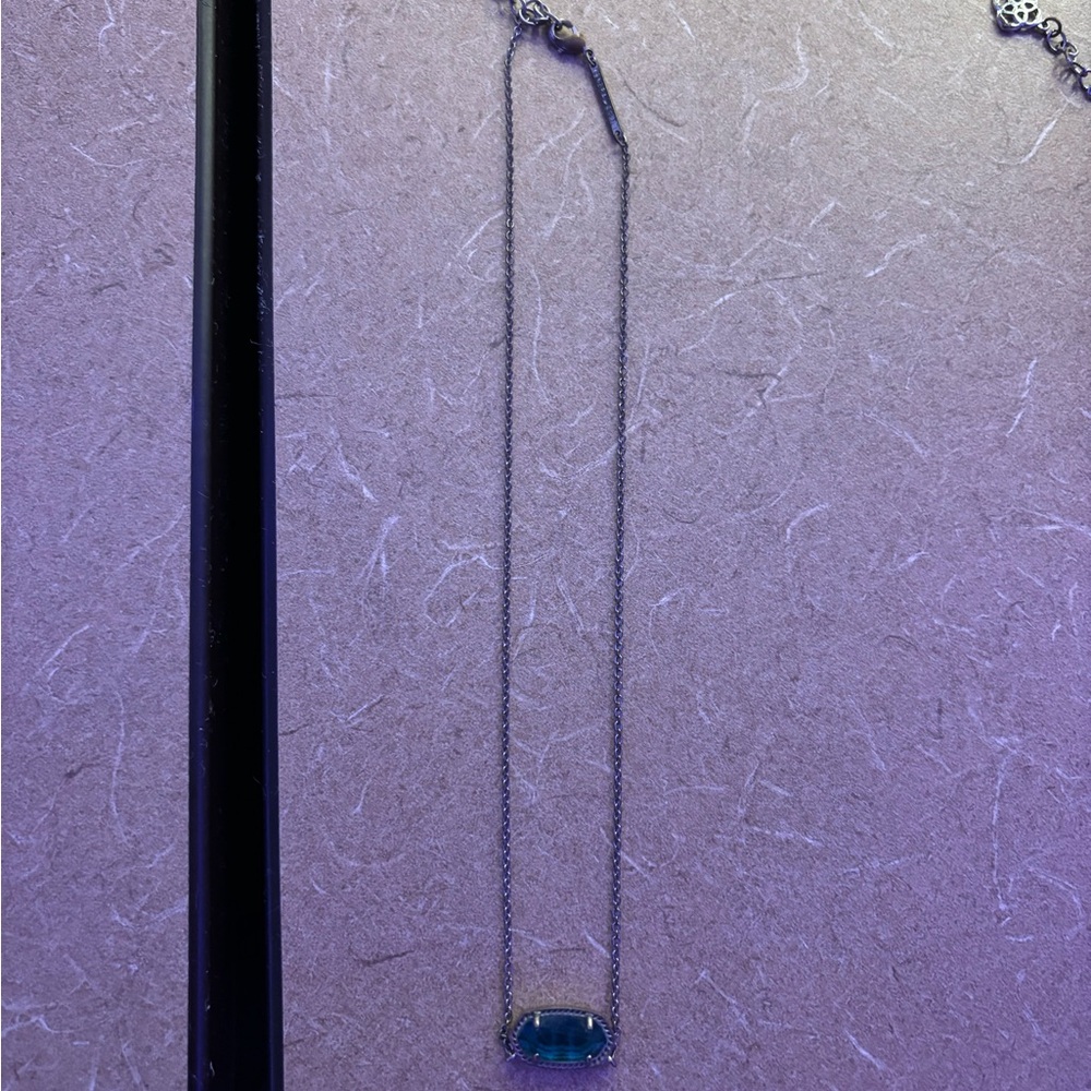 Elegant Silver Necklace with Blue Pendant